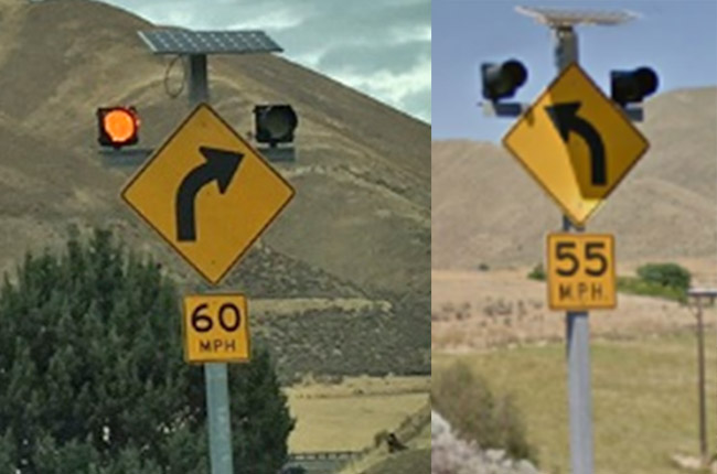 Curve warning signs with flashing beacons